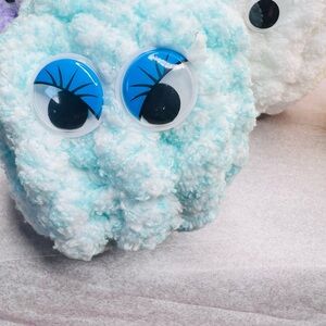 Plush Cloud Toy with Blue Eyes